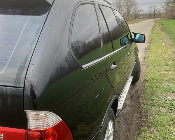 Черный БМВ Х5, объемом двигателя 2.99 л и пробегом 244 тыс. км за 12000 $, фото 9 на Automoto.ua