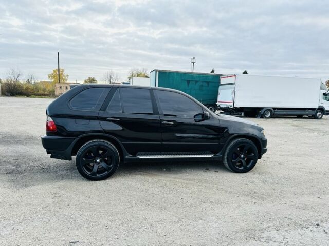 Черный БМВ Х5, объемом двигателя 3 л и пробегом 390 тыс. км за 11950 $, фото 5 на Automoto.ua