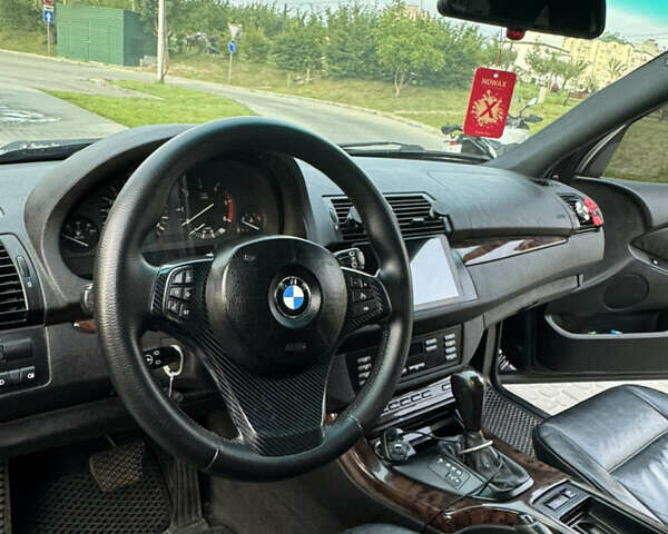 Черный БМВ Х5, объемом двигателя 2.99 л и пробегом 303 тыс. км за 11101 $, фото 30 на Automoto.ua