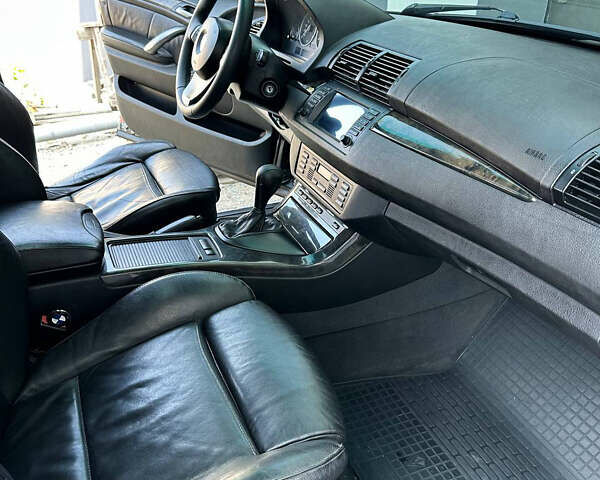 Черный БМВ Х5, объемом двигателя 3 л и пробегом 140 тыс. км за 10500 $, фото 6 на Automoto.ua