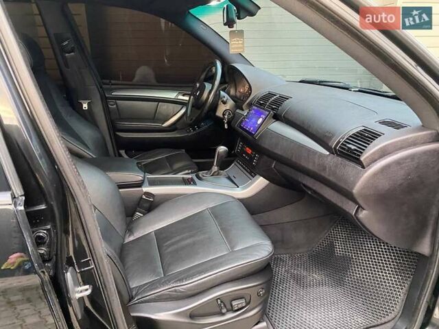 Черный БМВ Х5, объемом двигателя 3 л и пробегом 394 тыс. км за 11650 $, фото 28 на Automoto.ua