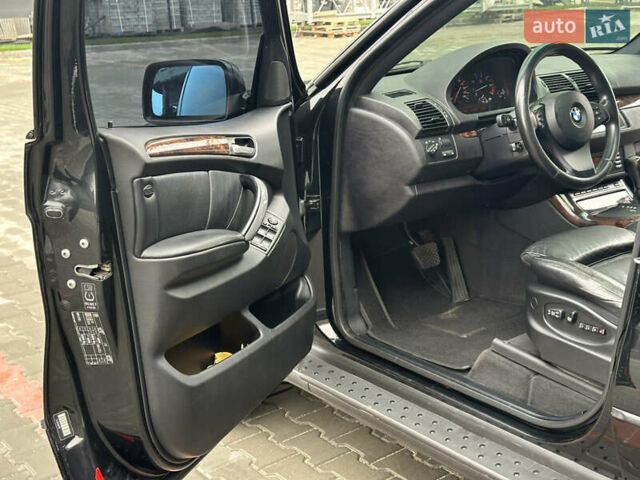 Черный БМВ Х5, объемом двигателя 4.4 л и пробегом 265 тыс. км за 10000 $, фото 28 на Automoto.ua