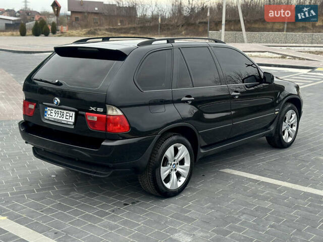 Черный БМВ Х5, объемом двигателя 3 л и пробегом 311 тыс. км за 8499 $, фото 5 на Automoto.ua