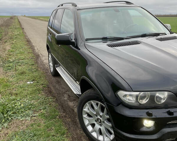 Черный БМВ Х5, объемом двигателя 2.99 л и пробегом 244 тыс. км за 12000 $, фото 2 на Automoto.ua