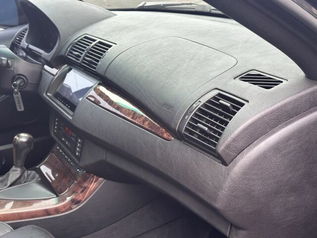 Черный БМВ Х5, объемом двигателя 4.4 л и пробегом 265 тыс. км за 11500 $, фото 18 на Automoto.ua