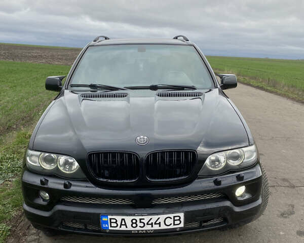 Черный БМВ Х5, объемом двигателя 2.99 л и пробегом 244 тыс. км за 12000 $, фото 1 на Automoto.ua