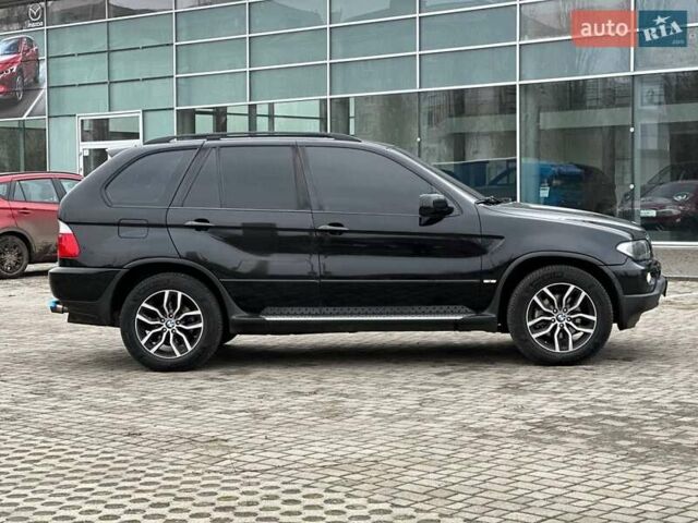 Черный БМВ Х5, объемом двигателя 3 л и пробегом 250 тыс. км за 12999 $, фото 1 на Automoto.ua