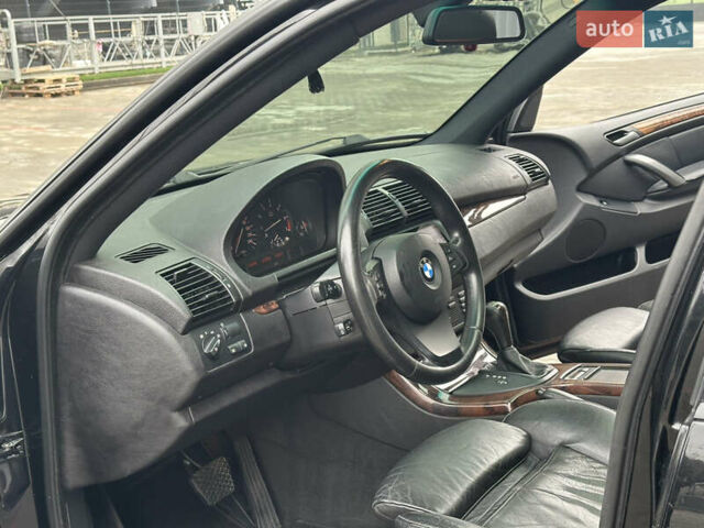 Черный БМВ Х5, объемом двигателя 4.4 л и пробегом 265 тыс. км за 10000 $, фото 25 на Automoto.ua