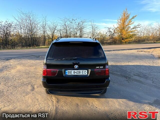 Черный БМВ Х5, объемом двигателя 3 л и пробегом 360 тыс. км за 12750 $, фото 4 на Automoto.ua