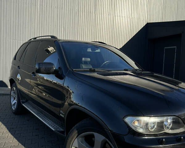 Черный БМВ Х5, объемом двигателя 3 л и пробегом 365 тыс. км за 10950 $, фото 4 на Automoto.ua