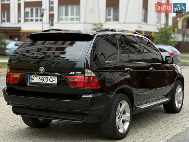 Чорний БМВ Х5, об'ємом двигуна 3 л та пробігом 350 тис. км за 11750 $, фото 20 на Automoto.ua