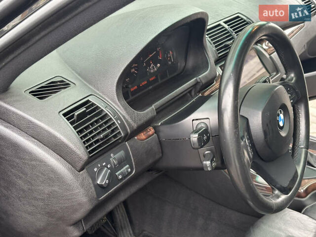 Черный БМВ Х5, объемом двигателя 4.4 л и пробегом 265 тыс. км за 10000 $, фото 22 на Automoto.ua