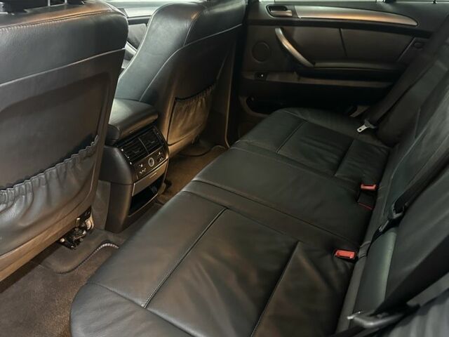 Черный БМВ Х5, объемом двигателя 3 л и пробегом 373 тыс. км за 7059 $, фото 6 на Automoto.ua