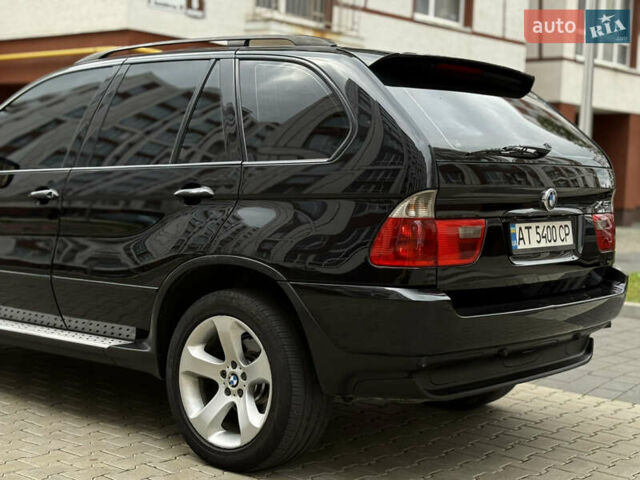 Чорний БМВ Х5, об'ємом двигуна 3 л та пробігом 350 тис. км за 11750 $, фото 15 на Automoto.ua