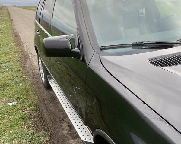 Черный БМВ Х5, объемом двигателя 2.99 л и пробегом 244 тыс. км за 12000 $, фото 3 на Automoto.ua