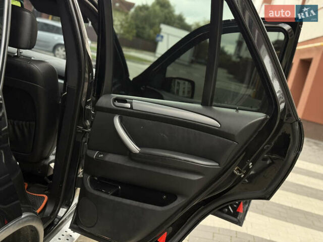 Чорний БМВ Х5, об'ємом двигуна 3 л та пробігом 350 тис. км за 11750 $, фото 45 на Automoto.ua