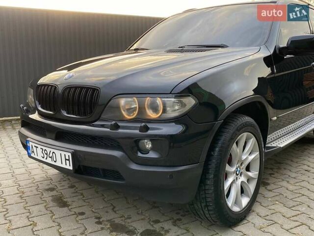 Черный БМВ Х5, объемом двигателя 3 л и пробегом 394 тыс. км за 11650 $, фото 11 на Automoto.ua