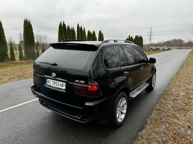 Чорний БМВ Х5, об'ємом двигуна 3 л та пробігом 340 тис. км за 6900 $, фото 4 на Automoto.ua
