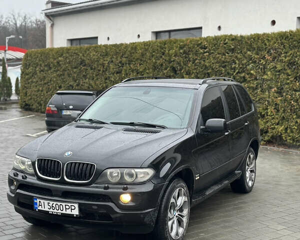 Черный БМВ Х5, объемом двигателя 4.4 л и пробегом 450 тыс. км за 7200 $, фото 2 на Automoto.ua