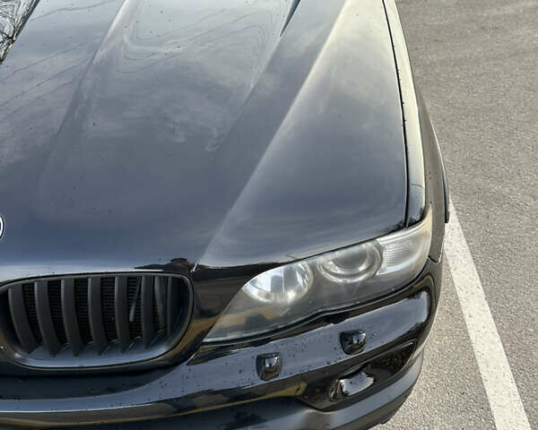 Черный БМВ Х5, объемом двигателя 4.8 л и пробегом 390 тыс. км за 12500 $, фото 17 на Automoto.ua