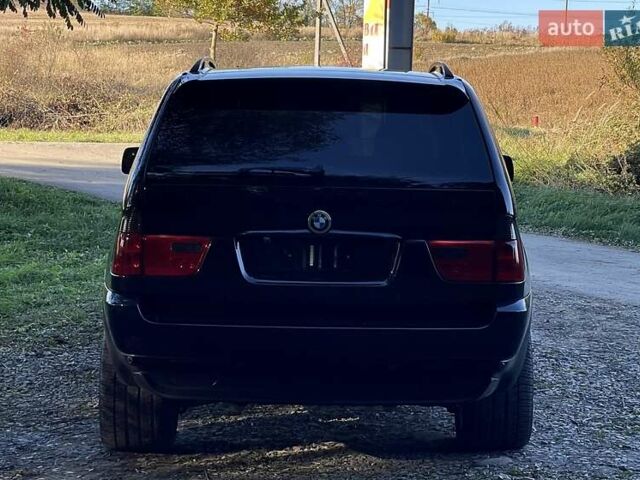Чорний БМВ Х5, об'ємом двигуна 3 л та пробігом 355 тис. км за 14900 $, фото 1 на Automoto.ua
