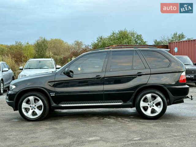 Чорний БМВ Х5, об'ємом двигуна 3 л та пробігом 447 тис. км за 11999 $, фото 28 на Automoto.ua