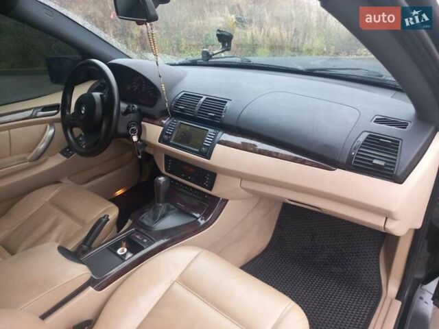 Черный БМВ Х5, объемом двигателя 3 л и пробегом 331 тыс. км за 12500 $, фото 24 на Automoto.ua