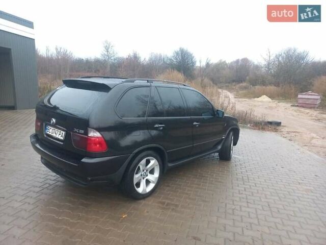 Черный БМВ Х5, объемом двигателя 3 л и пробегом 331 тыс. км за 12500 $, фото 7 на Automoto.ua