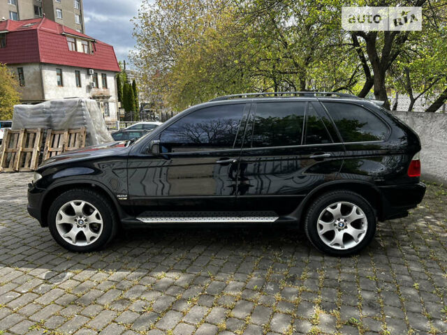 Чорний БМВ Х5, об'ємом двигуна 3 л та пробігом 300 тис. км за 13200 $, фото 11 на Automoto.ua