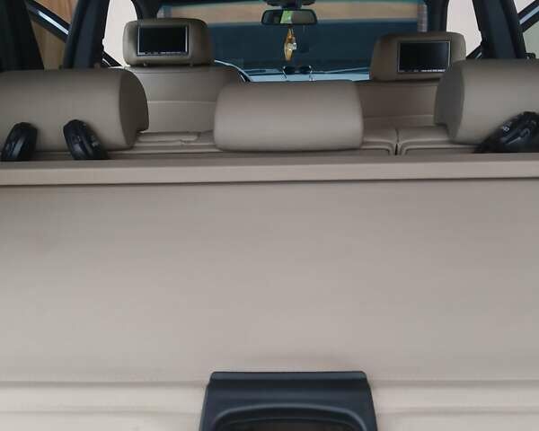 Черный БМВ Х5, объемом двигателя 3 л и пробегом 280 тыс. км за 14700 $, фото 17 на Automoto.ua