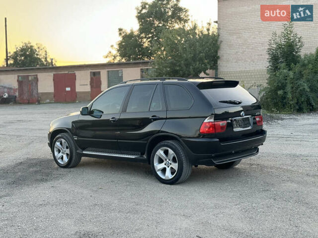 Чорний БМВ Х5, об'ємом двигуна 3 л та пробігом 320 тис. км за 12999 $, фото 7 на Automoto.ua