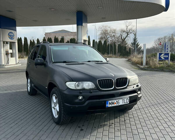 Чорний БМВ Х5, об'ємом двигуна 3 л та пробігом 300 тис. км за 4999 $, фото 6 на Automoto.ua