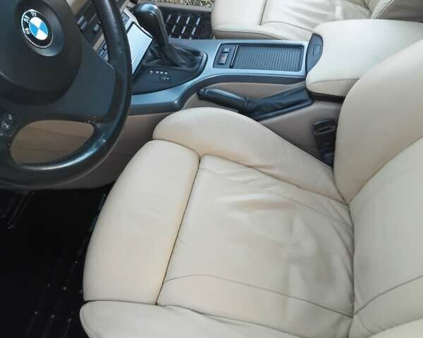 Черный БМВ Х5, объемом двигателя 3 л и пробегом 462 тыс. км за 12900 $, фото 54 на Automoto.ua