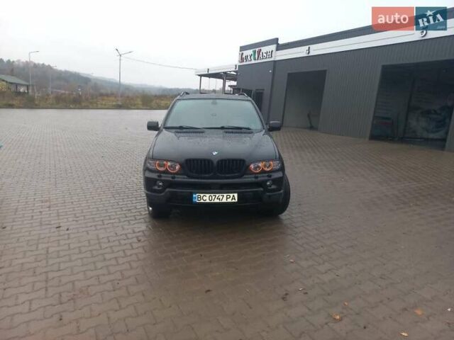 Черный БМВ Х5, объемом двигателя 3 л и пробегом 331 тыс. км за 12500 $, фото 1 на Automoto.ua