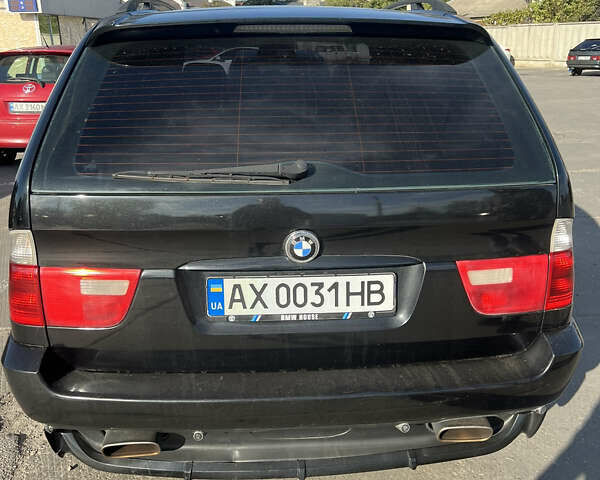 Черный БМВ Х5, объемом двигателя 4.8 л и пробегом 350 тыс. км за 7500 $, фото 1 на Automoto.ua