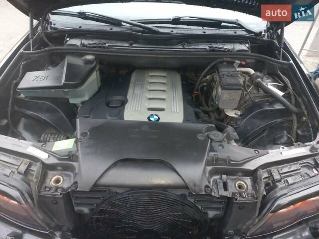 Черный БМВ Х5, объемом двигателя 3 л и пробегом 331 тыс. км за 12500 $, фото 39 на Automoto.ua