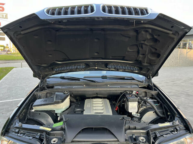 Чорний БМВ Х5, об'ємом двигуна 3 л та пробігом 297 тис. км за 15777 $, фото 78 на Automoto.ua