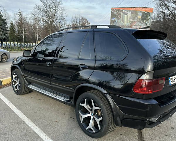 Черный БМВ Х5, объемом двигателя 4.8 л и пробегом 390 тыс. км за 12500 $, фото 3 на Automoto.ua