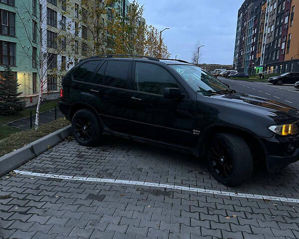 Черный БМВ Х5, объемом двигателя 3 л и пробегом 240 тыс. км за 11200 $, фото 1 на Automoto.ua