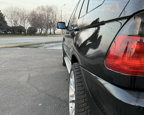 Черный БМВ Х5, объемом двигателя 3 л и пробегом 370 тыс. км за 11999 $, фото 5 на Automoto.ua