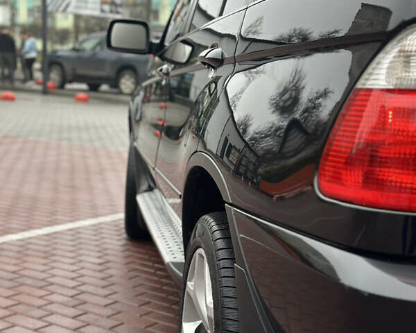 Чорний БМВ Х5, об'ємом двигуна 4.4 л та пробігом 226 тис. км за 11500 $, фото 5 на Automoto.ua
