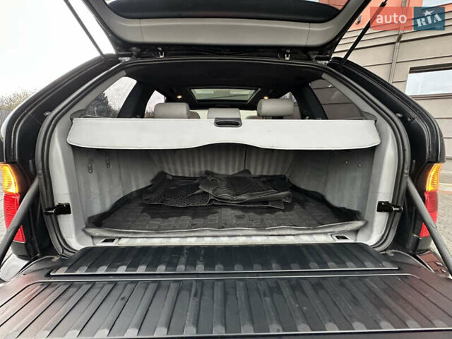 Чорний БМВ Х5, об'ємом двигуна 3 л та пробігом 304 тис. км за 10350 $, фото 88 на Automoto.ua