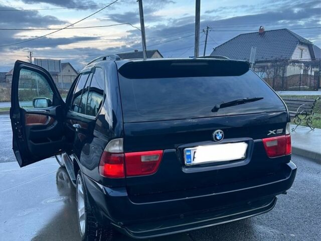 Черный БМВ Х5, объемом двигателя 3 л и пробегом 280 тыс. км за 13313 $, фото 1 на Automoto.ua
