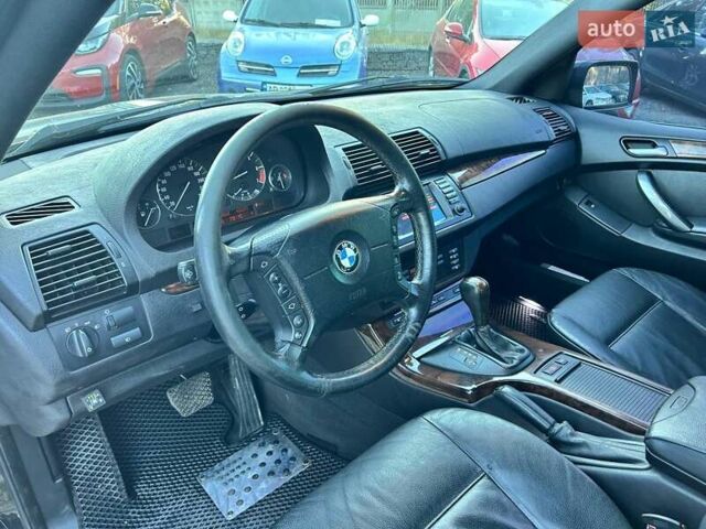 Черный БМВ Х5, объемом двигателя 4.4 л и пробегом 311 тыс. км за 9500 $, фото 13 на Automoto.ua