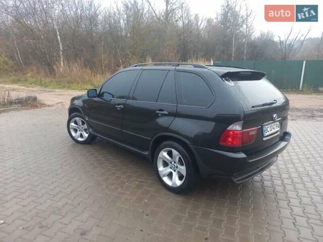 Черный БМВ Х5, объемом двигателя 3 л и пробегом 331 тыс. км за 12500 $, фото 5 на Automoto.ua