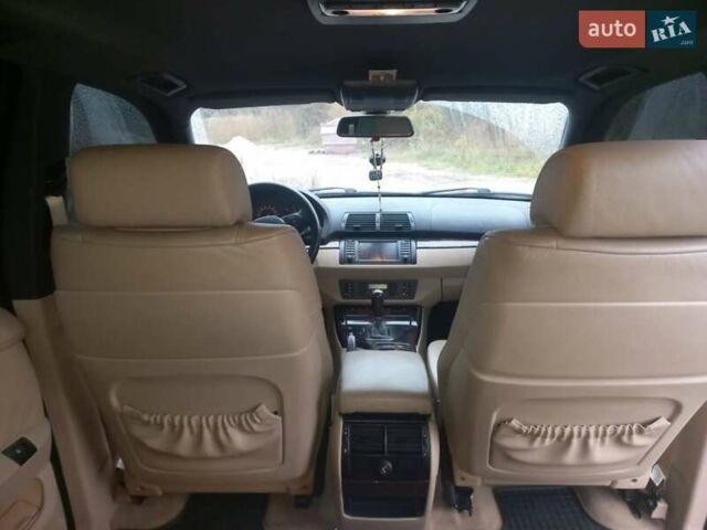 Черный БМВ Х5, объемом двигателя 3 л и пробегом 331 тыс. км за 12500 $, фото 29 на Automoto.ua