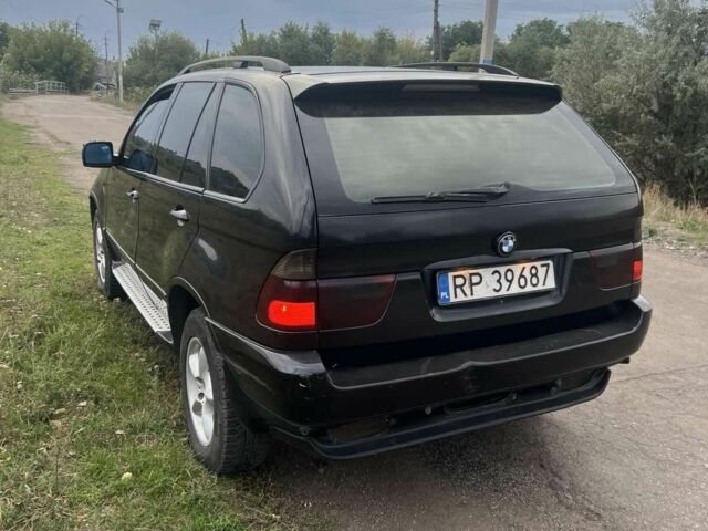 Чорний БМВ Х5, об'ємом двигуна 3 л та пробігом 300 тис. км за 4000 $, фото 2 на Automoto.ua