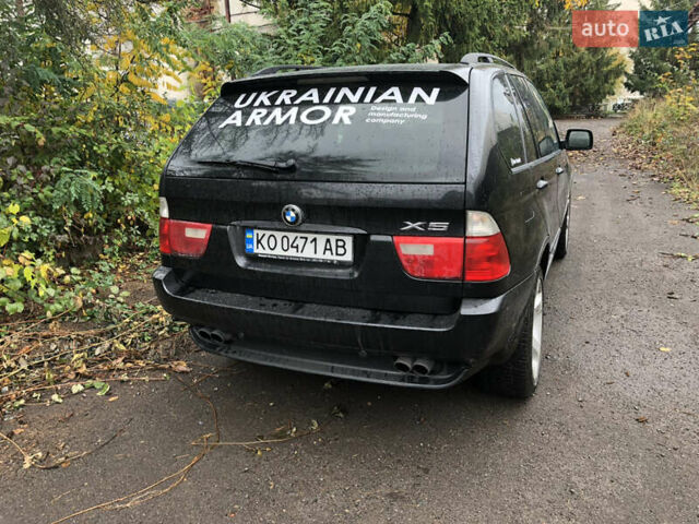 Черный БМВ Х5, объемом двигателя 4.4 л и пробегом 265 тыс. км за 9100 $, фото 5 на Automoto.ua