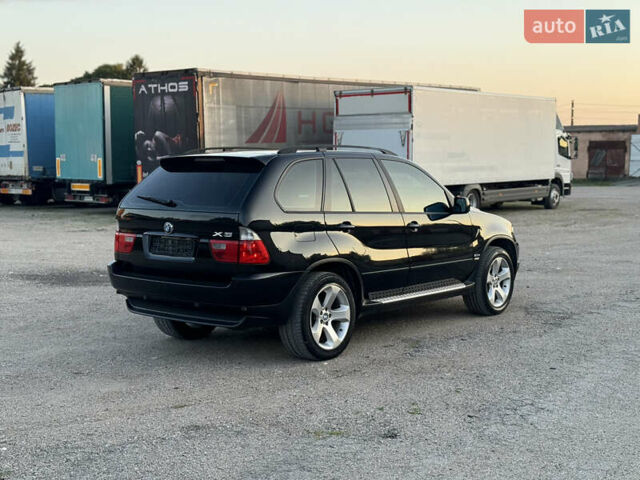 Чорний БМВ Х5, об'ємом двигуна 3 л та пробігом 320 тис. км за 12999 $, фото 5 на Automoto.ua