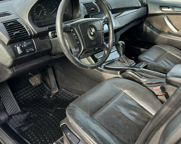 Чорний БМВ Х5, об'ємом двигуна 3 л та пробігом 300 тис. км за 4999 $, фото 21 на Automoto.ua